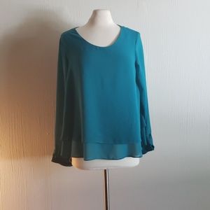 Chiffon feel flaired, double layered green blouse
